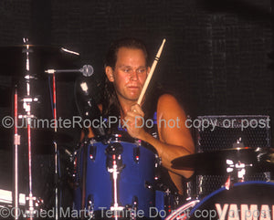 Photo of drummer Ian Haugland of Europe in concert in 1989 by Marty Temme