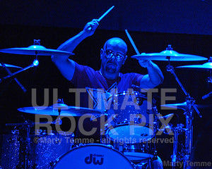 Photo of Jason Bonham in concert with the band Foreigner in 2005 by Marty Temme