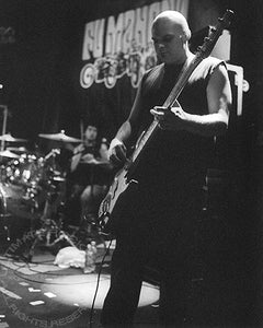 Photo of bass player Brad Davis of Fu Manchu in concert in 2002 by Marty Temme