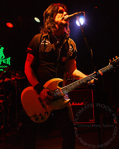 Photo of guitarist Gilby Clarke in concert in 2008 by Marty Temme