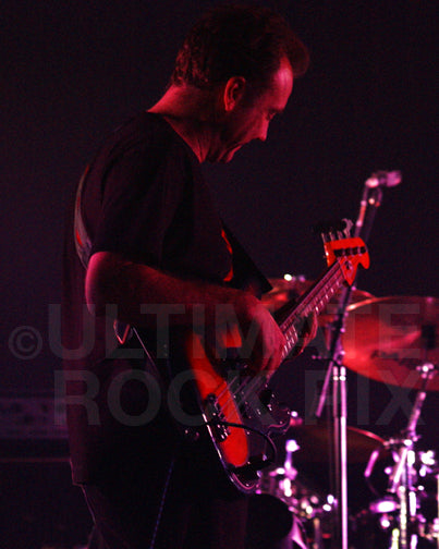 Photo of bassist player Guy Pratt of David Gilmour in concert by Marty Temme