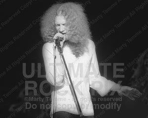 Photo of singer Lou Gramm&nbsp;of Foreigner in concert with Black Sheep in 1974 by Marty Temme