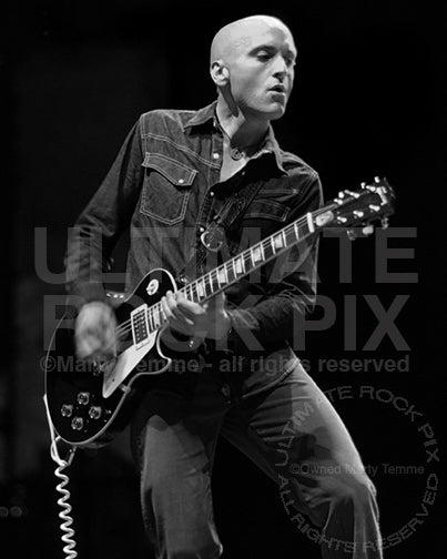 Black and white photo of Michael Ward of Ben Harper playing a Les Paul in concert by Marty Temme