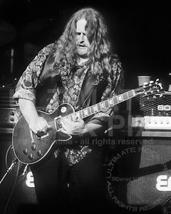 Black and white photo of Warren Haynes of The Allman Brothers playing slide guitar in 1994 by Marty Temme