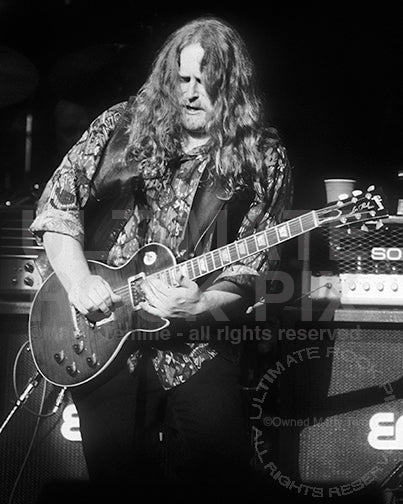 Black and white photo of Warren Haynes of The Allman Brothers playing slide guitar in 1994 by Marty Temme