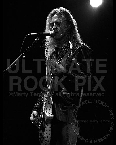 Black and white photo of Jerry Cantrell playing his Les Paul in concert in 2002 by Marty Temme