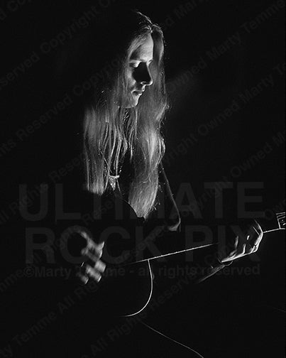 Photo of Jerry Cantrell of Alice In Chains playing an acoustic guitar by Marty Temme