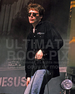 Photo of Jim Reid of The Jesus and Mary Chain in concert in 1992 by Marty Temme