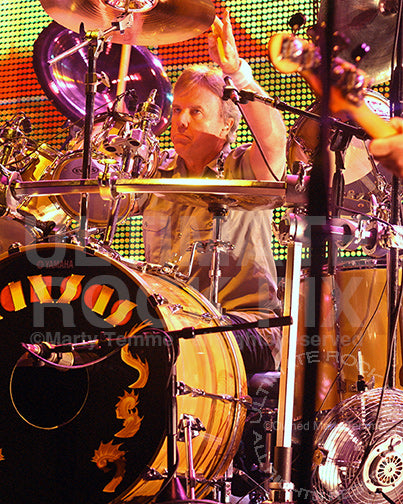 Photo of drummer Phil Ehart of Kansas performing in concert by Marty Temme
