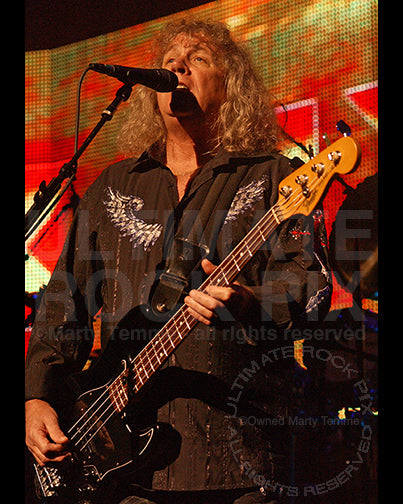 Photo of bass player Billy Greer of Kansas in concert by Marty Temme