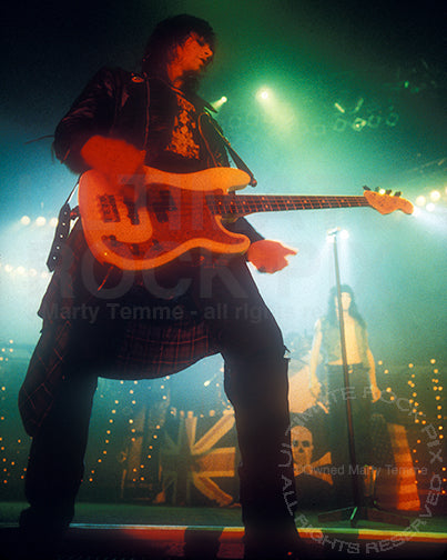 Photo of bass player Kelly Nickels of L.A. Guns in concert in 1991 by Marty Temme