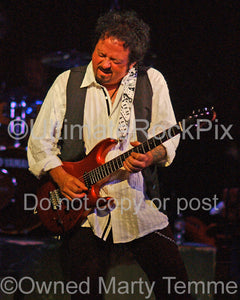 Photo of Steve Lukather in concert in 2008 by Marty Temme