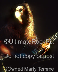 Photo of guitar player Mike Scaccia of Ministry in concert in 1992 by Marty Temme