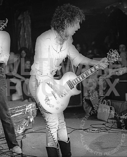 Photo of Sylvain Sylvain of New York Dolls in concert in 1974 by Marty Temme