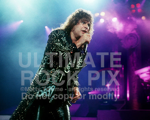 Photo of singer Ozzy Osbourne performing in concert in 1989 by Marty Temme