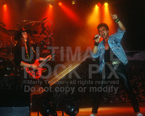 Photo of Geoff Tate and Chris DeGarmo of Queensryche onstage in 1989 by Marty Temme