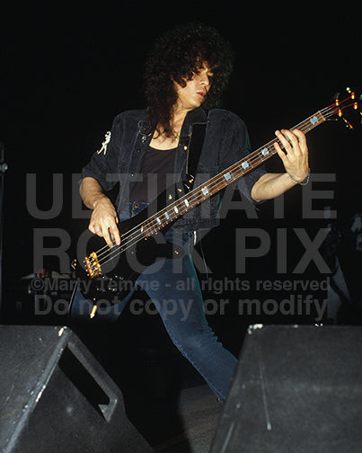 Photo of bassist Eddie Jackson of Queensryche in concert in 1989 by Marty Temme