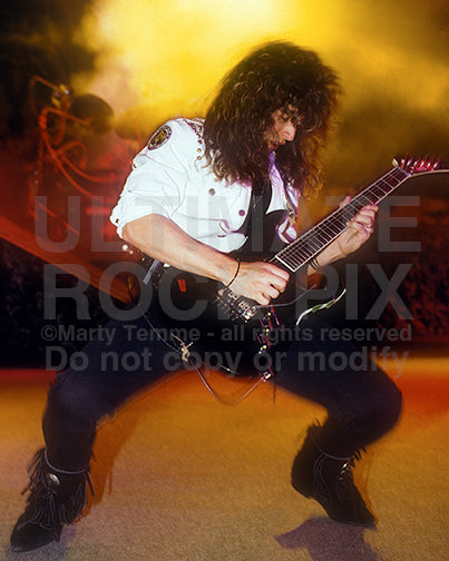 Photo of guitarist Michael Wilton of Queensryche in concert in 1989 by Marty Temme