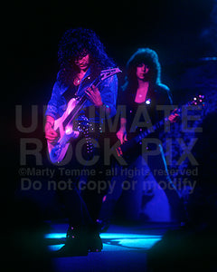 Photo of Michael Wilton and Eddie Jackson of Queensryche in concert in 1989 by Marty Temme