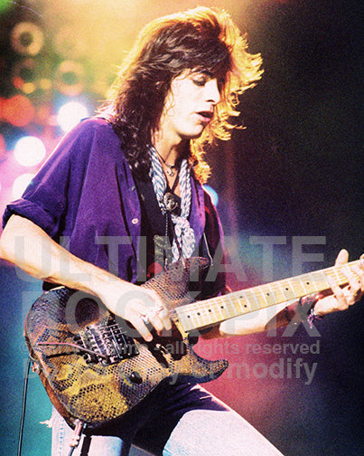 Photo of guitarist Warren DeMartini of Ratt in concert in 1989 by Marty Temme