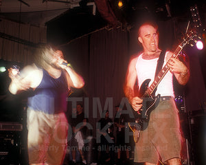 Photo of guitar player Scott Ian in concert in 1994 by Marty Temme