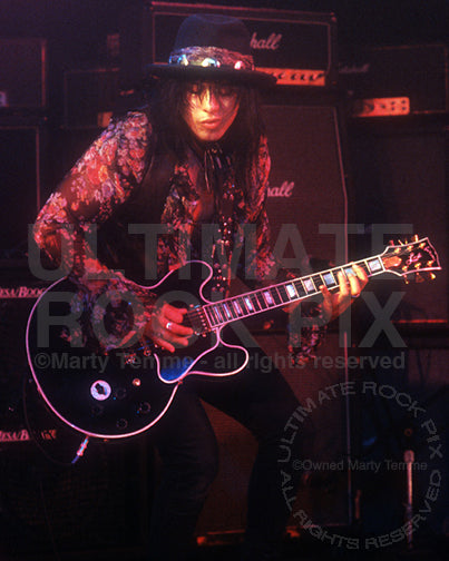 Photo of Scarlet Rowe of Saigon Saloon in concert in 1989 in Hollywood, California by Marty Temme