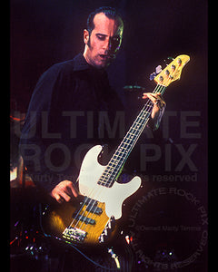 Photo of Robert Deleo of Stone Temple Pilots in concert by Marty Temme