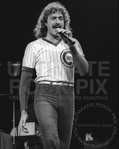 Black and white photo of Dennis DeYoung of Styx in concert in 1979 by Marty Temme