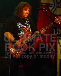 Photo of Steve Priest of The Sweet in concert in 2008 by Marty Temme