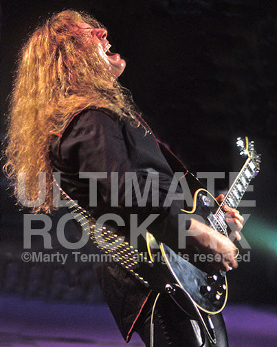 Photo of John Sykes of Thin Lizzy in onstage in 2004 by Marty Temme