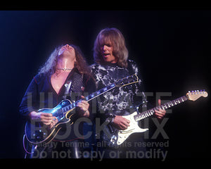 Photo of John Sykes and Scott Gorham of Thin Lizzy in concert in 2004 by Marty Temme