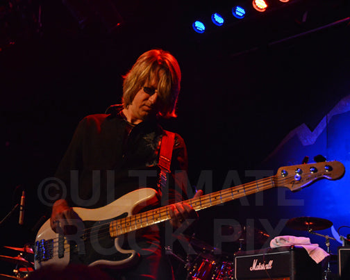 Photo of Rodney O'Quinn of Pat Travers in concert in 2009 by Marty Temme