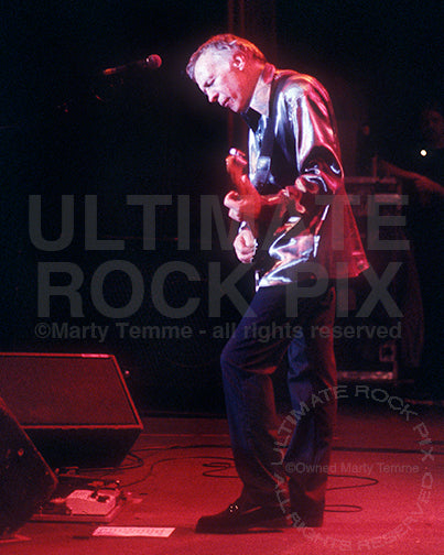 Photo of Robin Trower playing a Fender Stratocaster in concert in 1999 by Marty Temme