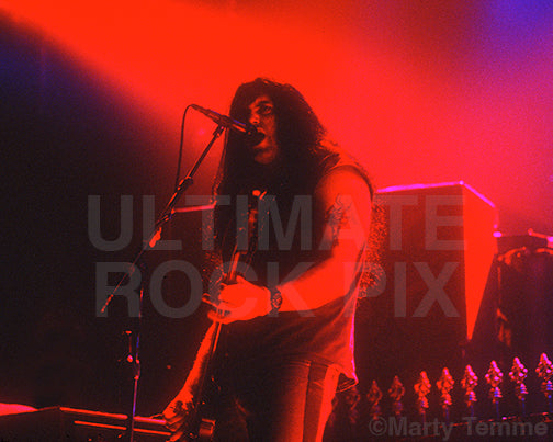 Photo of Peter Steele of Type O Negative singing in concert by Marty Temme