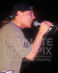Photo of singer Whitfield Crane of Ugly Kid Joe in concert in 1992 by Marty Temme