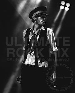 Black and white photo of vocalist Scott Weiland of Velvet Revolver with his megaphone in concert by Marty Temme