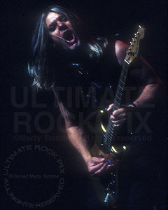 Photo of guitarist Billy Morris of Warrant in concert in 2003 by Marty Temme