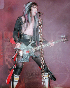 Photo of Blackie Lawless of W.A.S.P. performing in concert in 1985 by Marty Temme