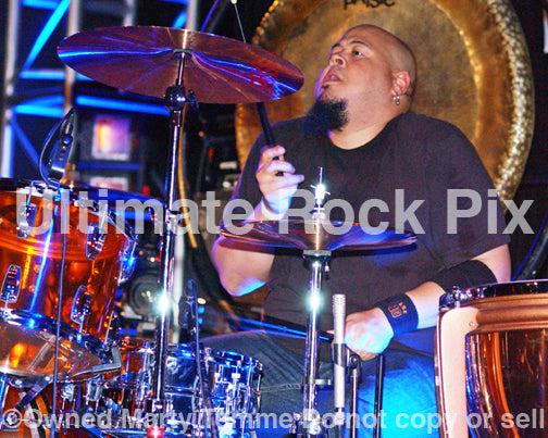 Photo of drummer Abe Laboriel Jr. in concert by Marty Temme