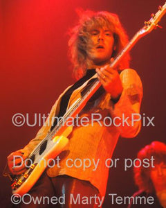 Photo of bass player Tom Hamilton of Aerosmith in concert in 1980 by Marty Temme