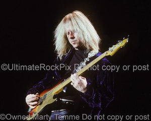 Photos of bass player Tom Hamilton onstage in 1990 by Marty Temme