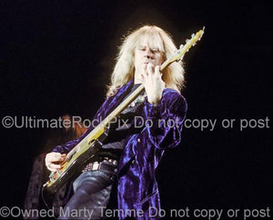 Photos of bass player Tom Hamilton onstage in 1990 by Marty Temme