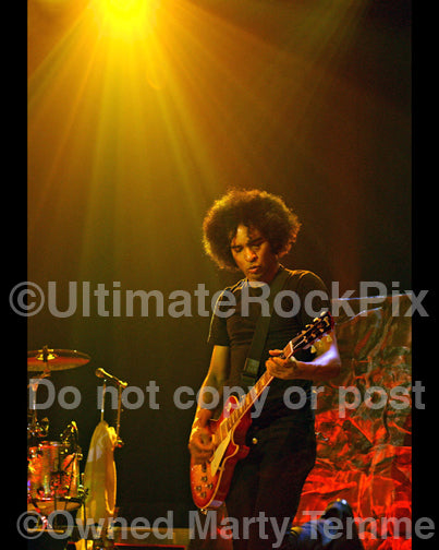 Photo of William DuVall of Alice in Chains playing a Les Paul in concert in 2010 by Marty Temme