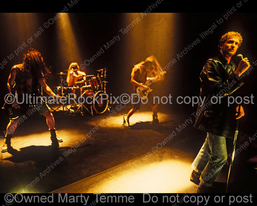 Photo of Alice in Chains performing in 1991 by Marty Temme