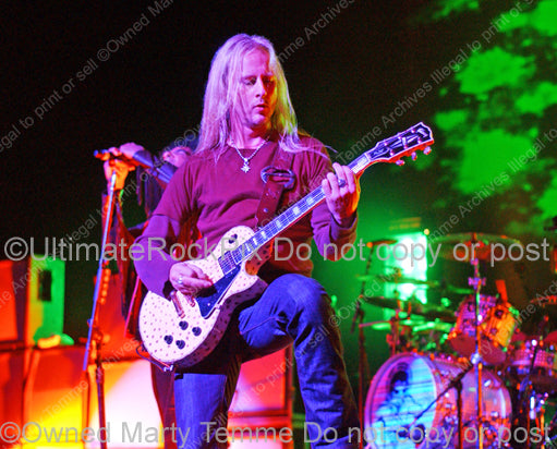 Photo of guitarist Jerry Cantrell of Alice in Chains in concert in 2006 by Marty Temme