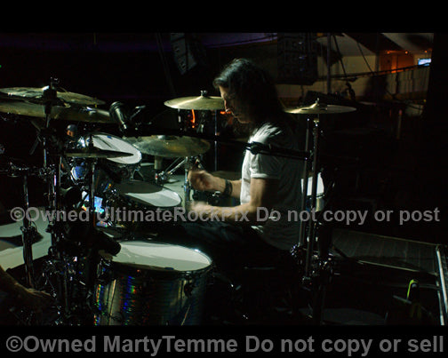 Photo of Sean Kinney of Alice In Chains during soundcheck in 2010 by Marty Temme
