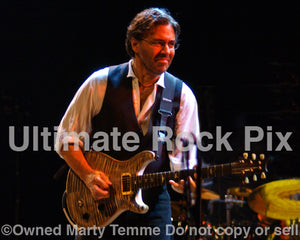 Photo of Al Di Meola playing a PRS guitar in concert in 2006 by Marty Temme