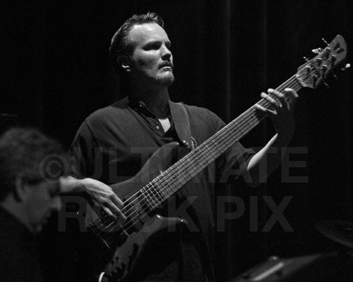 Photo of bassist Mike Pope of Al Di Meola in concert in 2006 by Marty Temme