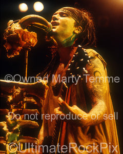 Photo of singer Al Jourgensen of Ministry in concert in 1992 by Marty Temme