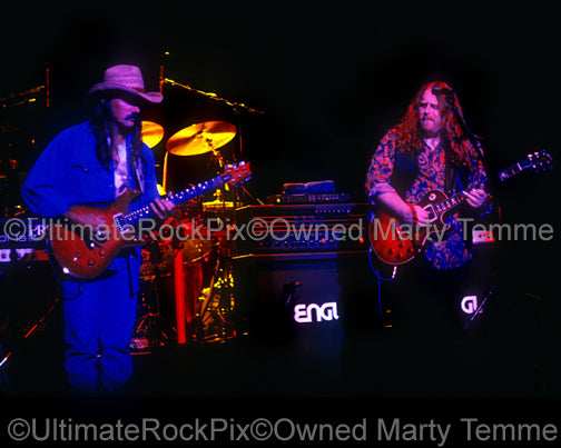    Photo of Warren Haynes and Dickey Betts of The Allman Brothers playing together in 1994 by Marty Temme